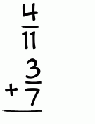 What is 4/11 + 3/7?